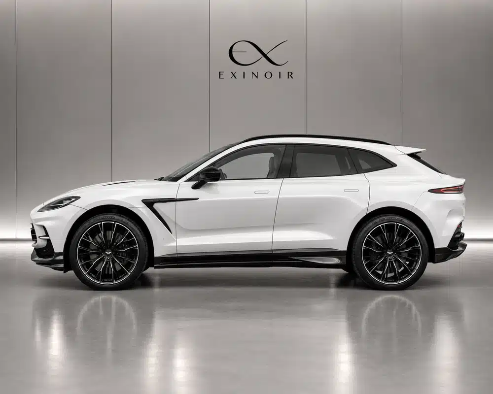 White Aston Martin DBX side view – luxury performance SUV available for rental in Europe