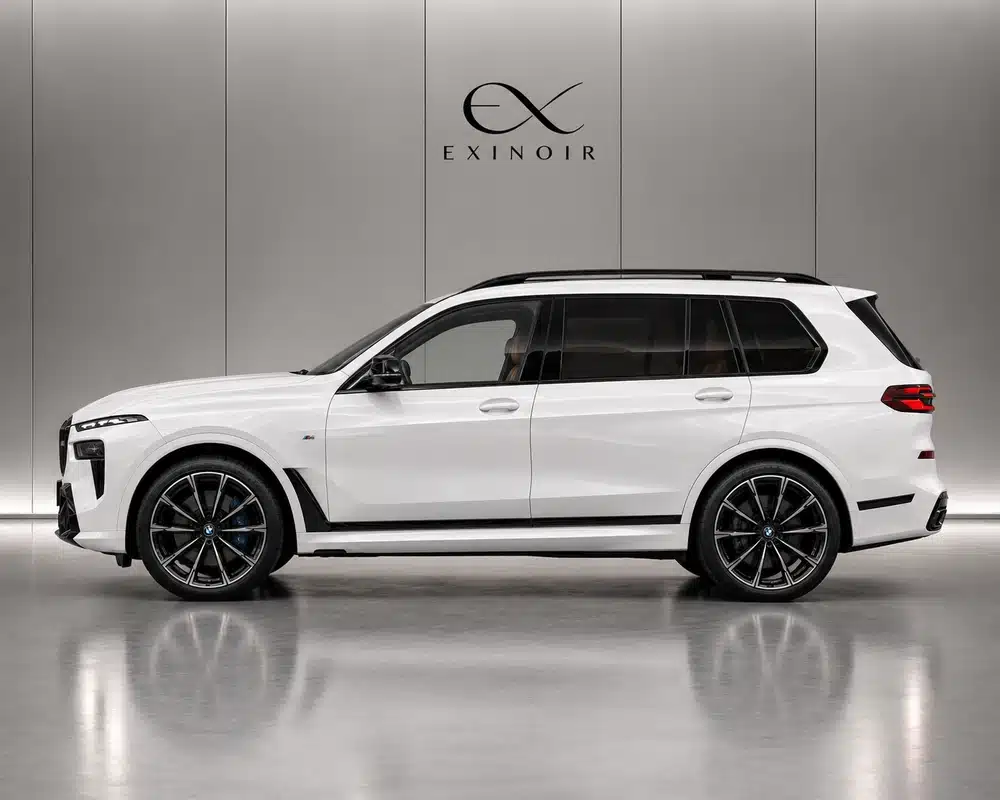 White BMW X7 M60i side profile – premium luxury SUV available for rental with Exinoir