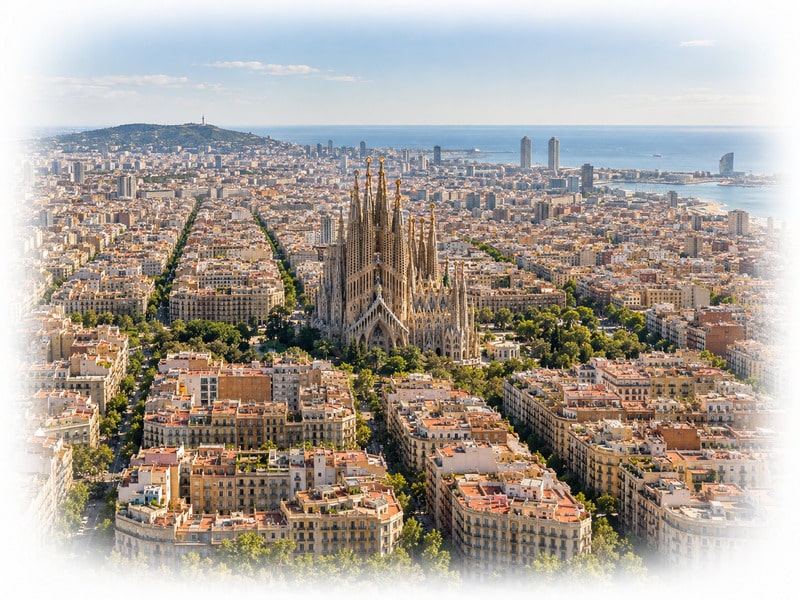 Panoramic Barcelona skyline with the Sagrada Família, Eixample district and Mediterranean coast