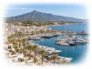Puerto Banús marina, luxury yachts and Marbella coastline beneath La Concha mountain