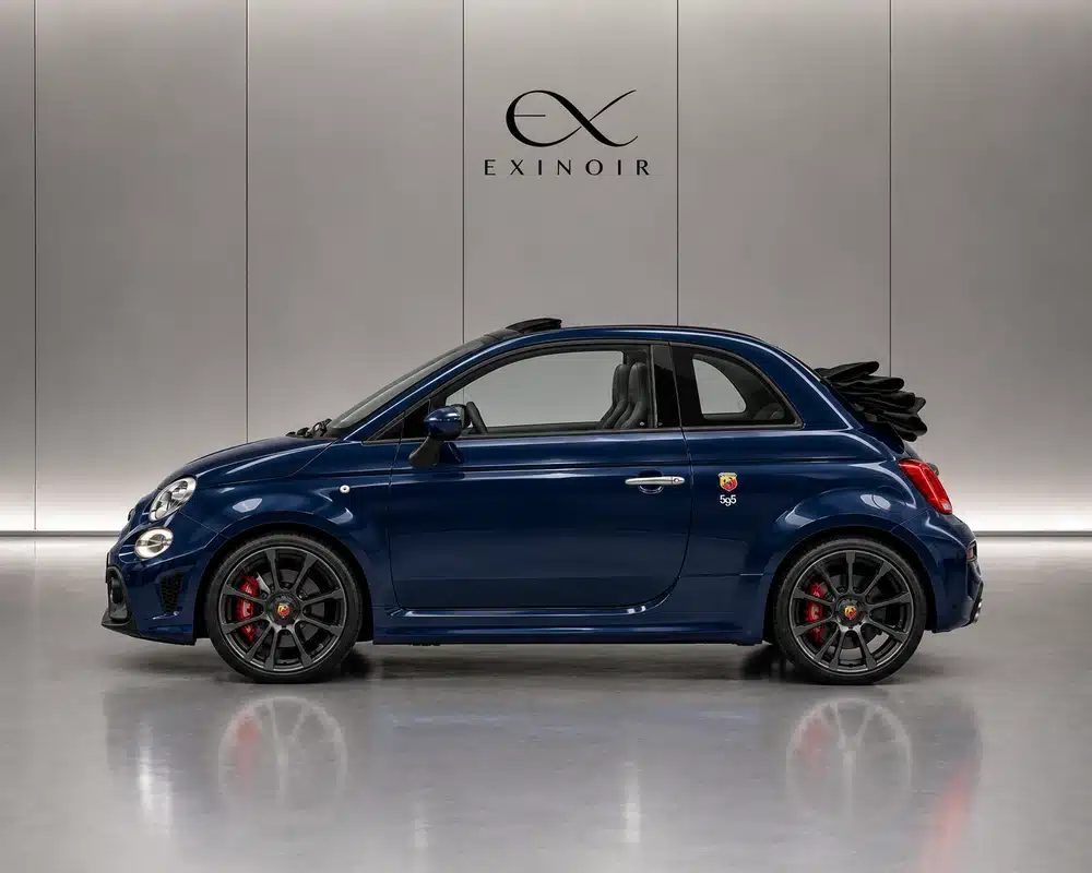Blue Abarth 595 Cabrio side profile – sporty convertible car rental in Europe with Exinoir
